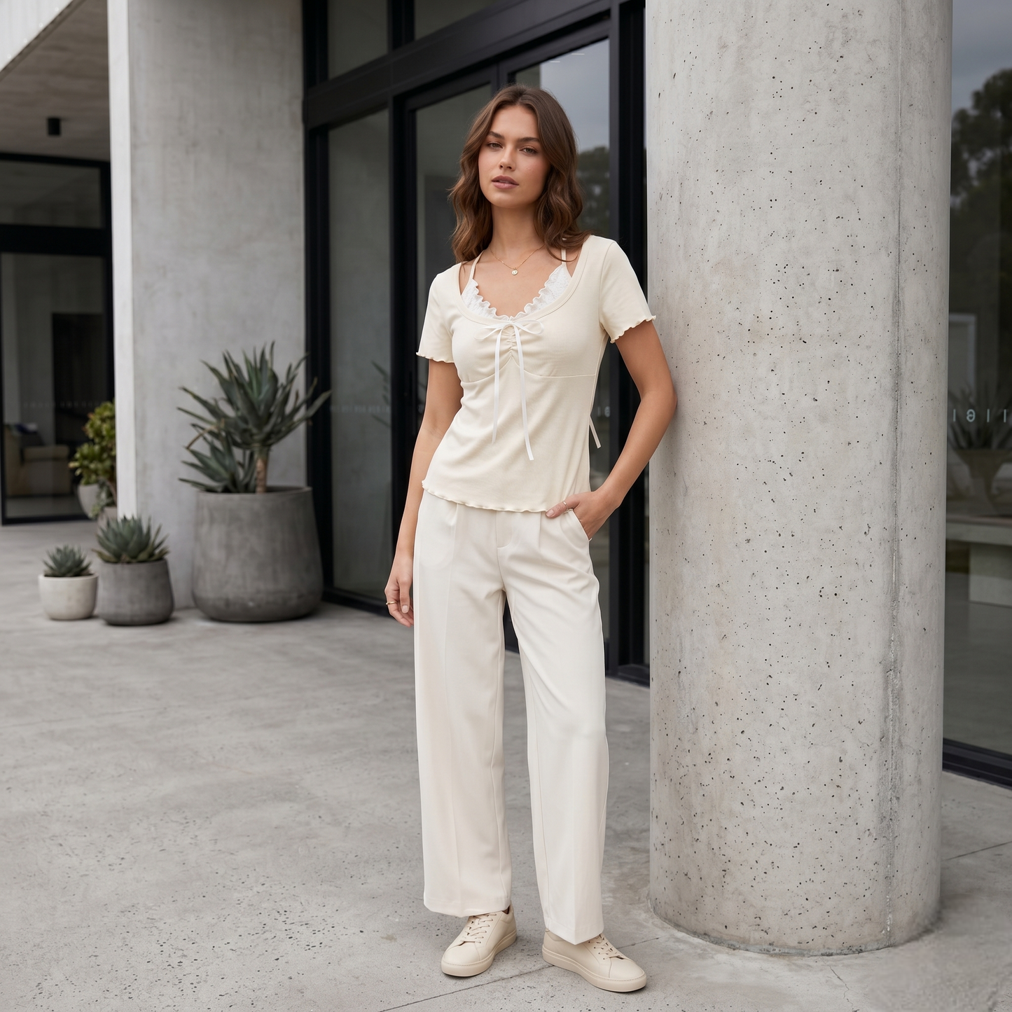 Textured Knit Top with Delicate Lace Ruffle Accent and Front Ribbon Tie